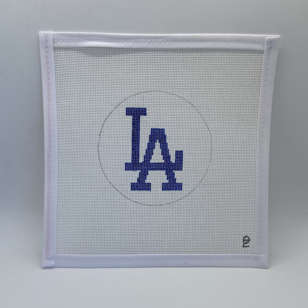 White 18 mesh needlepoint canvas with a dark blue interlocking Dodger 